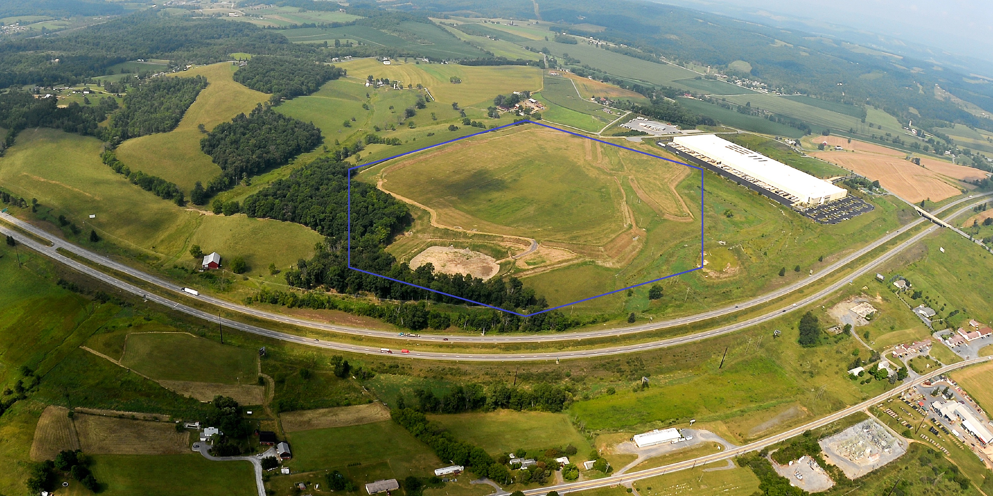 Aerial view of Bedford County Business Park II. The 75 acres is a KOZ pad-ready permitted site.