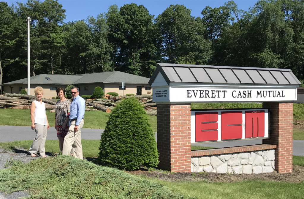 ECM recently purchased the former police barracks, located adjacent to the ECM home office. The acquisition will support ECM's continued growth. Looking at the new facility are: Bridget Glass, Executive Vice President, ECM Service Agency, Sharon Waltman, Information Systems Supervisor and Randy Shaw, President/CEO Everett Cash Mutual Ins. Co.